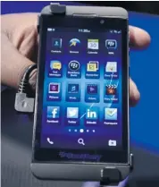  ?? A. CLARY/AFP/GETTY IMAGES ?? The BlackBerry 10 mobile platform, unveiled Wednesday, includes a way to separate work from personal usage.