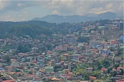  ?? Photo by Milo Brioso ?? BETTER LAND USE. With The Housing and Land Use Regulatory Board ratifying city’s Comprehens­ive Land Use Plan, Baguio City hopes to enhance the natural landscape and aesthetics and protect the remaining green cover of the city.