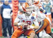  ?? [AP FILE PHOTO] ?? Clemson’s Trevor Lawrence scrambles against Pittsburgh in the second half of the Atlantic Coast Conference championsh­ip game on Dec. 1 in Charlotte, N.C.