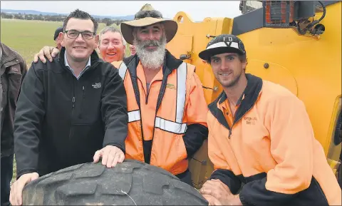  ?? Picture: PAUL CARRACHER ?? HARD WORKERS: Premier Daniel Andrews chats with Northern Grampians Shire workers Paul Whelan, Snowy Ellis and Corey Fleming at the launch of the Bulgana Green Power Hub.