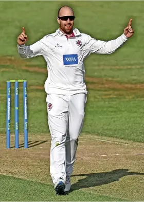  ?? Pictures: Dan Mullan/Getty ?? Somerset’s Jack Leach celebrates taking a wicket