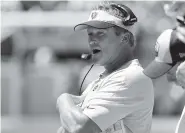  ?? AP PHOTO/LYNNE SLADKY ?? Oakland Raiders coach Jon Gruden works the sideline during the Sept. 23 game against the Dolphins in Miami Gardens, Fla.