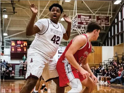  ?? JAMES BEAVER/FOR MEDIANEWS GROUP ?? Abington’s Zyeir Olasewere (42) disagrees with the foul just called on him against Upper Dublin’s Drew Stover (15).