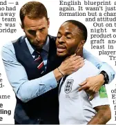  ??  ?? Arm round the shoulder: Sterling and Southgate