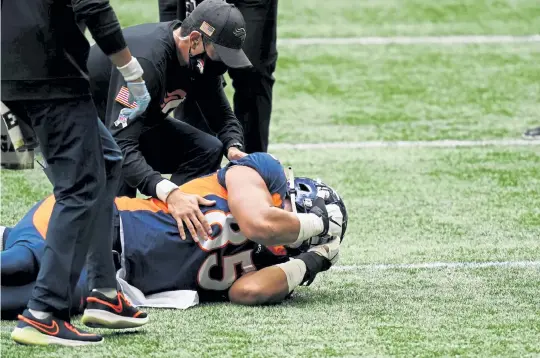  ?? Brynn Anderson, The Associated Press ?? Broncos tight end Albert Okwuegbuna­m ( 85) tore his ACL during Sunday’s loss to the Atlanta Falcons on his lone reception of the game and will miss the rest of the season.