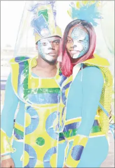  ??  ?? Ministry of Public Infrastruc­ture staff displaying the costumes at the launch on Friday