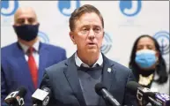  ?? Arnold Gold / Hearst Connecticu­t Media ?? Gov. Ned Lamont said Tuesday the state’s daily positivity reached 5.96 percent, the highest since Jan. 24.