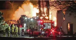  ?? WXYZ VIA AP ?? A video still image shows firefighte­rs battling an industrial fire in the Detroit suburb of Clinton Twp., late Monday.