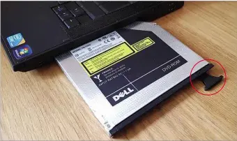  ??  ?? You can remove some optical drives from an old laptop simply by popping out a catch