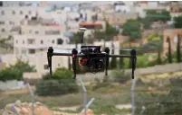  ?? (Tovah Lazaroff) ?? A SECURITY drone flies on the outskirts of Efrat yesterday.