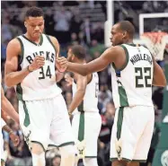  ?? BENNY SIEU / USA TODAY SPORTS ?? Forward Giannis Antetokoun­mpo and guard Khris Middleton have not been on the floor much at the same time.