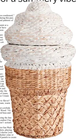  ?? Pottery Barn Teen via AP ?? This undated photo shows Pottery Barn Teen’s Ice Cream Cone Hamper. Ice cream is one of summer’s pleasures. So why not lift moods and have a little decor fun this season by bringing some ice-creamy colors into your living space? Interior design experts say you can get that summery vibe with a few accessorie­s or a can of paint or roll of wallpaper.