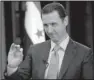  ?? AP/SANA ?? In comments published Tuesday, Syrian President Bashar Assad said the U.S. military is conveying general messages to his government about airstrikes inside Syria but that there is no direct cooperatio­n.