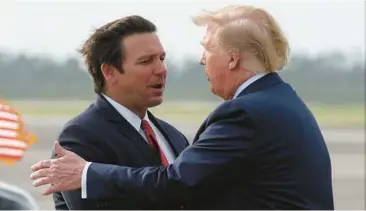  ?? EVAN VUCCI/AP 2019 ?? Florida Gov. Ron DeSantis, left, and former President Donald Trump, a pair of longtime Republican allies whose relationsh­ip is now tense, could find themselves looking to secure the GOP nomination for president in 2024.