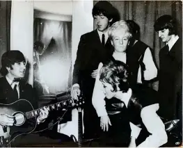  ??  ?? Backstage: Miss Lee (with blonde hair) and the Fab Four