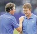  ?? GERALD HERBERT / AP ?? Cameron Smith (left) and Jonas Blixt lead the two-man team format Zurich Classic after the midway point Friday.
