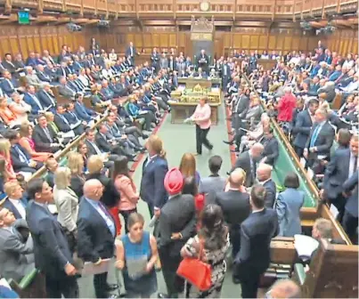  ??  ?? SNP MPs walk out of the House of Commons during Prime Minister’s Questions.