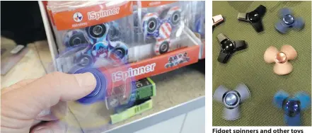  ??  ?? Stores can’t keep the fidget spinner toys in stock and parents are going crazy trying to find them for their kids.