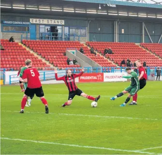  ??  ?? Strike two Above left, Jason Jarvis nets the opener for Stirling University while right, Jason Penker heads home number two. All photos by George Vekic