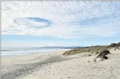  ?? Picture: RNZ ?? An unusual cloud formation seen from Forestry Beach, Te Arai.
