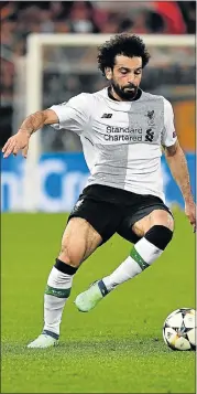  ?? Picture: ALBERTO PIZZOLI/AFP ?? RED HOT: Liverpool midfielder Mohamed Salah controls the ball during the Uefa semifinal second leg against AS Roma