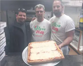  ?? GARY PULEO - MEDIANEWS GROUP ?? Holding one of Via Veneto’s famous Sicilian pizzas are, from left, Steve Altieri, longtime Via Veneto employee Gus Giancimino and Via Veneto owner Anthony Stabile. Via Veneto was the 2019 winner of the Montco’s Best Pizza Tournament.