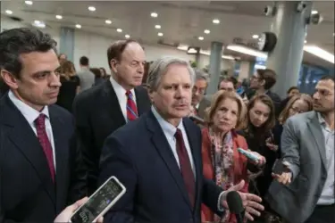  ?? AP PHOTO/J. SCOTT APPLEWHITE ?? Sen. John Hoeven, R-N.D., center, speaks as he is joined by Rep. Tom Graves, R-Ga., far left, Sen. Richard Shelby, R-Ala., the top Republican on the bipartisan group bargainers working to craft a border security compromise in hope of avoiding another government shutdown, and Sen. Shelley Moore Capito, R-W.Va., right, after a briefing with officials about the US-Mexico border, on Capitol Hill in Washington, Wednesday, Feb. 6, 2019.