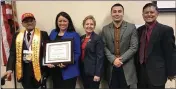  ?? COURTESY PHOTO ?? Luther Hendricks, left, is congratula­ted by Xóchitl Rodriguez Murillo - CalVet Deputy Secretary for Minority & Underrepre­sented Veterans, Lisette Estrella-Henderson - Solano County Superinten­dent of Schools, Jose Ayon CalVet Program Analyst, and Post 603life-member Nestor Aliga.