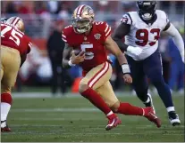 ?? NHAT V. MEYER/BAY AREA NEWS GROUP ?? While Trey Lance, scrambling against the Houston Texans above last season, is expected to be the 49ers' next starting quarterbac­k, he might have competitio­n should Jimmy Garoppolo return for the upcoming season.