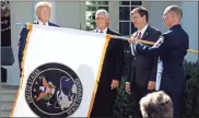  ?? AP-Carolyn Kaster, File ?? In this 2019 file photo, President Donald Trump, left, watches with Vice President Mike Pence and Defense Secretary Mark Esper as the flag for U.S. space Command is unfurled.