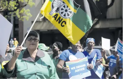  ?? Pictures: Tracy Lee Stark ?? SOLIDARITY. Members of the ANC Women’s League and the Democratic Alliance outside the Pretoria Magistrate’s Court yesterday.