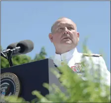  ?? Photo courtesy of Coast Guard Academy/Telfair H. Brown Sr. ?? Former Commandant of the Coast Guard Adm. Thad W. Allen introduces keynote speaker President George W. Bush during recent graduation exercises. Allen has been outspoken about the government shutout, saying in a recent visit, “If you get to some point where you have people required to work, not being paid, their families subjected to stress, I think sooner or later you have to expect there’s going to be a problem with readiness and ability to respond.”