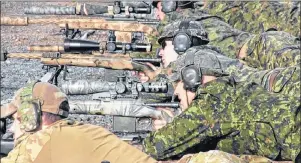  ?? CP PHOTO ?? Snipers take the opportunit­y to calibrate their rifles at the 19th annual Canadian Internatio­nal Sniper Concentrat­ion at CFB Gagetown in Oromocto, N.B.