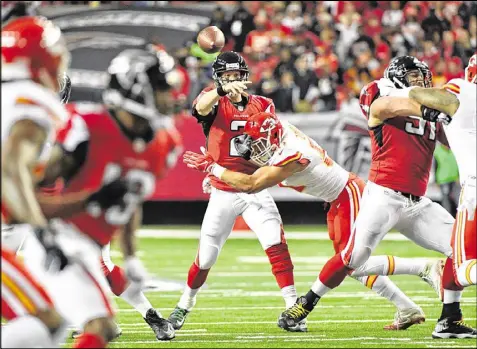  ?? HYOSUB SHIN / HSHIN@AJC.COM ?? Falcons quarterbac­k Matt Ryan had another outstandin­g game, only to throw it away by tossing a pick-six late in the first half and a pick-two on a blown conversion attempt at game’s end, both to Eric Berry.