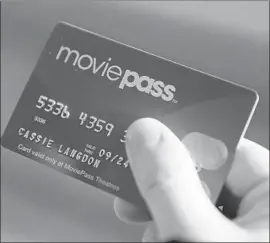  ?? Darron Cummings Associated Press ?? MOVIEPASS lets users see multiple movies for less than $10 a month. Its parent company, Helios & Matheson, disclosed that it was running low on cash.