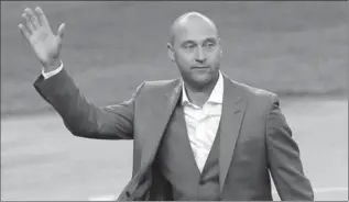  ?? ASSOCIATED PRESS FILE PHOTO ?? Derek Jeter waves to fans during a ceremony retiring his number at Yankee Stadium in New York on May 14.