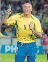  ?? ASSOCIATED PRESS FILE PHOTO ?? Brazil’s Ronaldo celebrates scoring against Germany during the World Cup soccer final at Yokohama Stadium in Japan, on June 30, 2002.