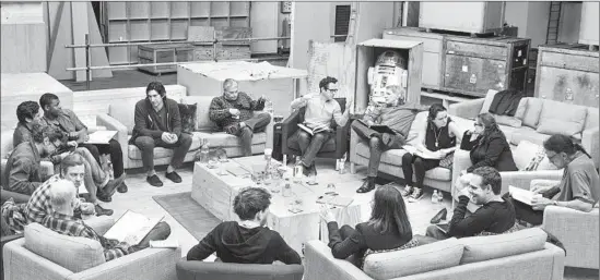 ?? David James
Lucasf ilm ?? J.J. ABRAMS, top center right, at the cast reading of “Star Wars: Episode VII” with, clockwise from right, Harrison Ford, Daisy Ridley, Carrie Fisher, Peter Mayhew, Bryan Burk, Kathleen Kennedy, Domhnall Gleeson, Anthony Daniels, Mark Hamill, Andy...