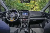  ??  ?? This is the cockpit of the 2021 Subaru Crosstrek Sport model.