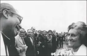  ??  ?? Indian Prime Minister Indira Gandhi (right) welcomes Rahman on Feb. 6, 1972, as he arrives on a two-day visit to India at the Calcutta airport in India.