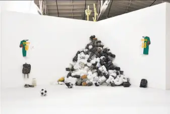  ?? Guerrero Gallery ?? Adam Feibelman uses black and white water bottles like those discarded by border-crossers.