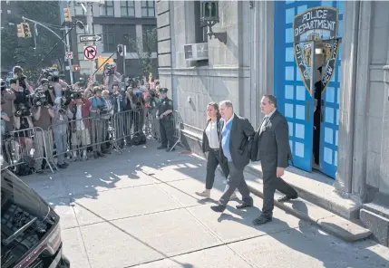  ?? NYT ?? Harvey Weinstein is led away in handcuffs after he turned himself in on charges of rape and criminal sexual acts in Manhattan on May 25, 2018.