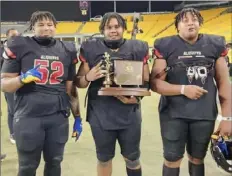  ?? Sherman McBride ?? Aliquippa linemen Neco Eberhardt, left, Jason McBride, center, and Naquan Crowder don’t get a lot of publicity. But they have a great nickname— Trench Dawgs.