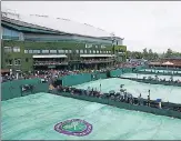  ?? REUTERS ?? Rain suspended quite a few matches on Day 1 of the Wimbledon on Monday.