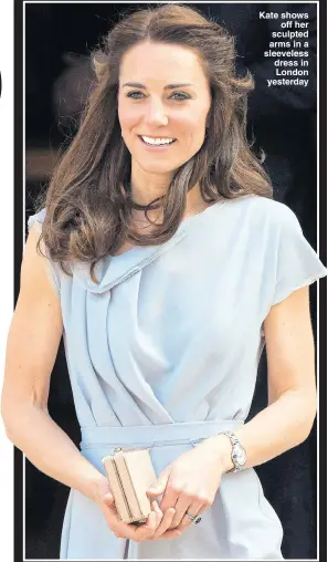  ??  ?? Kate shows off her sculpted arms in a sleeveless dress in London yesterday