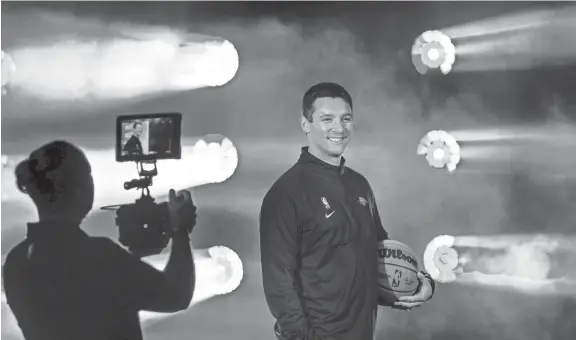  ?? PHOTOS BY CHRIS LANDSBERGE­R/THE OKLAHOMAN ?? Thunder coach Mark Daigneault poses for photos during the team's media day at the Paycom Center on Monday.