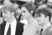  ?? IAN GAVAN/GETTY 2011 ?? Rupert Grint, from left, Emma Watson and Daniel Radcliffe appear in the HBO Max reunion special “Harry Potter 20th Anniversar­y: Return to Hogwarts.”