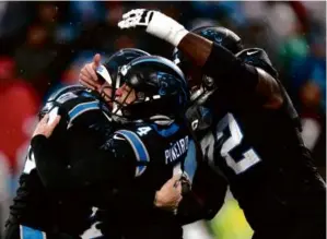  ?? JARED C. TILTON/GETTY IMAGES ?? Eddy Pineiro handled the scoring for the Panthers with three field goals, including a 23-yarder as time expired to beat the Falcons.