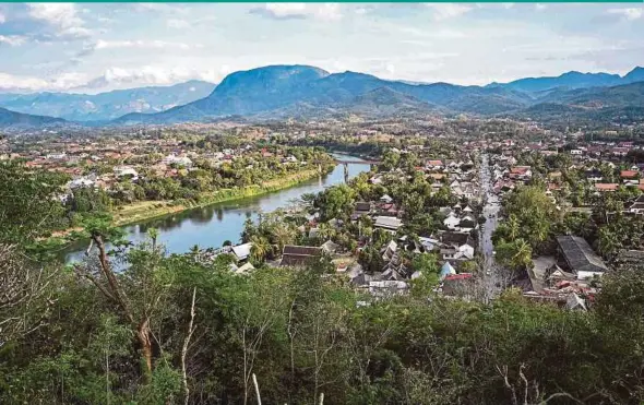  ?? AFP PIC ?? A view of the Mekong river in Luang Prabang, Laos, last month. The Luang Prabang hydroelect­ric dam, which is under constructi­on, is due to be completed in 2030.