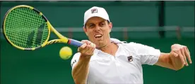  ?? MATTHIAS HANGST/GETTY IMAGES ?? Sam Querrey (above) beat Tennys Sandgren in four sets on Monday to advance to the quarterfin­als at Wimbledon where he will face Rafael Nadal.